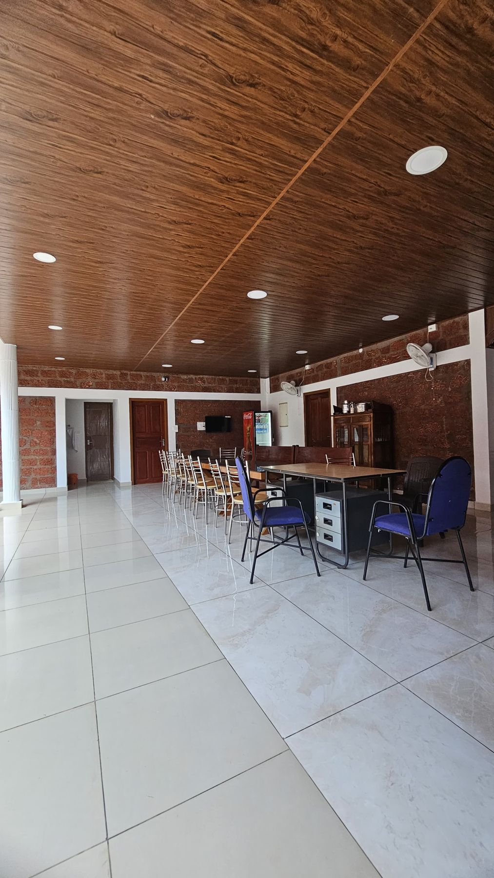 Hall with wooden ceiling and dining table